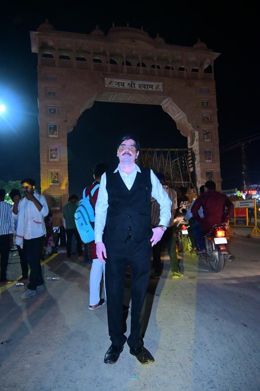 Arbind Kumar Srivastava Standing at Jai Shree Shyam Arch Gate (Night)